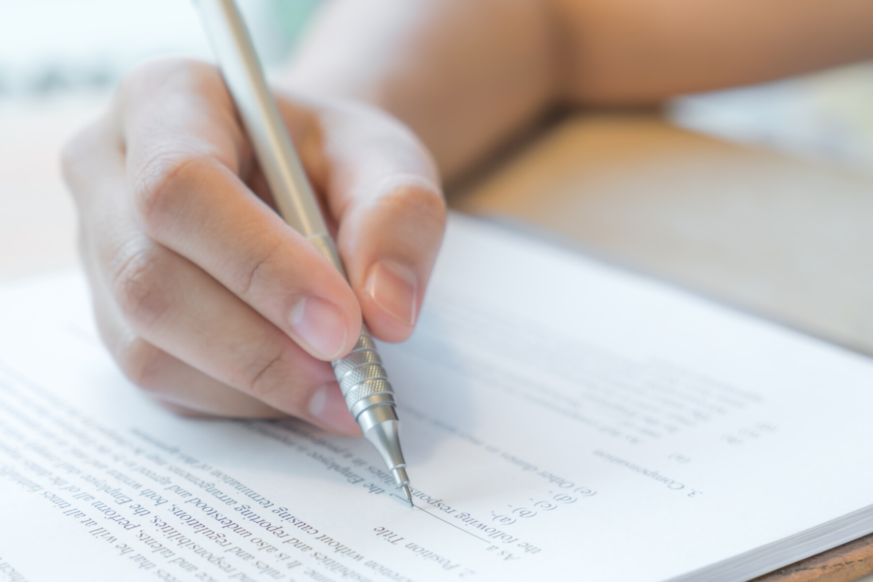 hand-with-pen-application-form.jpg